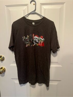 Men's Black Graphic Holiday T-Shirt Featuring Festive Characters